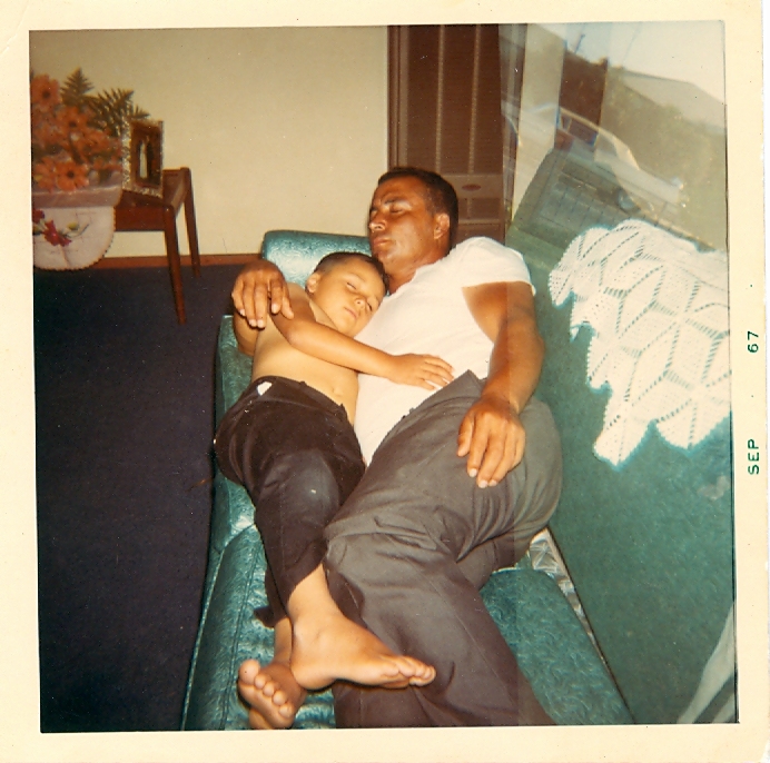 Grandpa taking a nap with my Tio Navi in 1967.